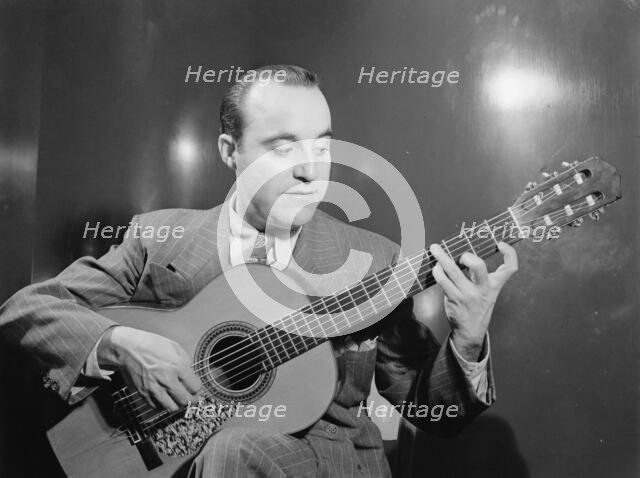 Portrait of Vincente Gomez, Café Society Uptown(?), New York, N.Y., ca. June 1946. Creator: William Paul Gottlieb.