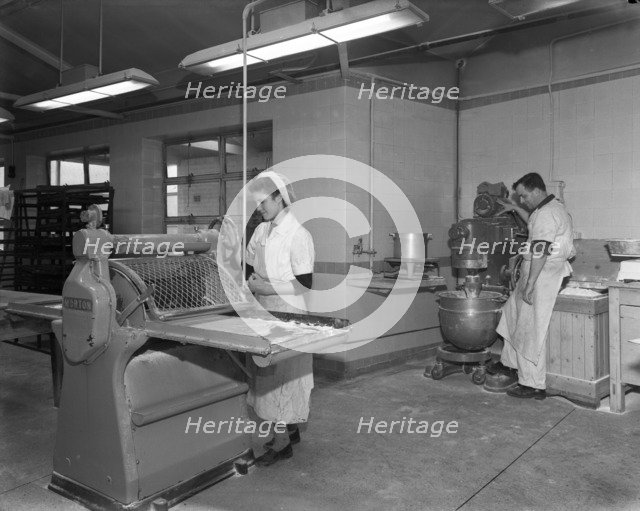 Pastry making for meat pies, Rawmarsh, South Yorkshire, 1955. Artist: Michael Walters