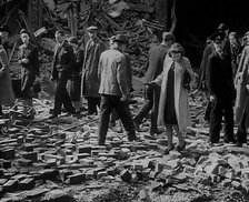 Crowds Walking Past Bombed Out Buildings, 1940. Creator: British Pathe Ltd.