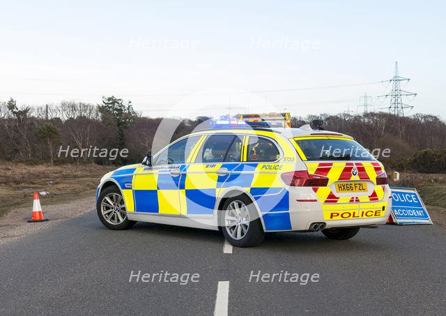 Police car and ambulance attending road traffic accident 2018. Creator: Unknown.
