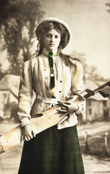 Postcard of a woman golfer, c1912. Artist: Unknown