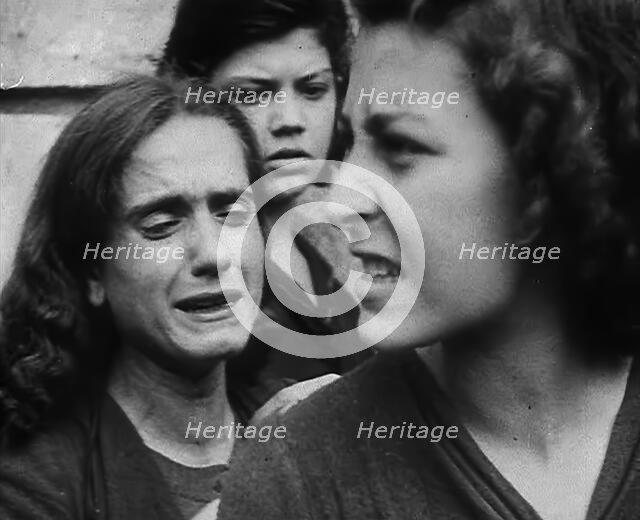 Italian Civilians Jostling in a Queue for Food, 1943-1944. Creator: British Pathe Ltd.