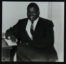 Oscar Peterson in the green room at Colston Hall, Bristol, 1955. Artist: Denis Williams