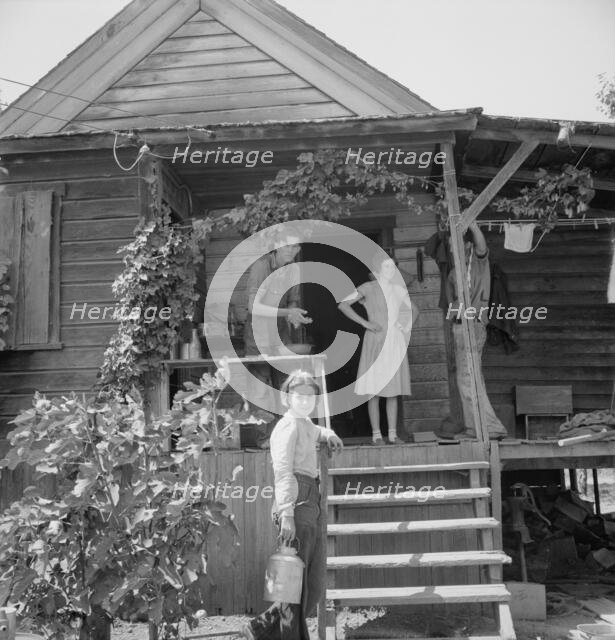 Hop farmer's children, small owner, and backyard..., near Independence, Polk County, Oregon, 1939. Creator: Dorothea Lange.