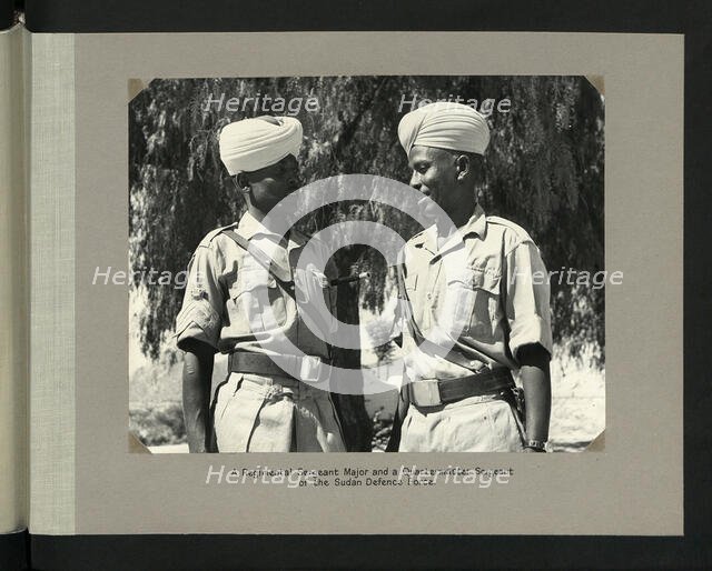 A Regiment Sergeant Major and a Quartermaster Sergeant of the Sudan Defence Force, 1964. Creators: Colonial Office, Unknown.