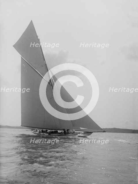 'The Lady Anne' 15 Metre class cutter sails upwind, 1912. Creator: Kirk & Sons of Cowes.