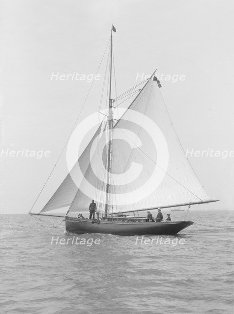 The gaff rigged cutter 'Wych' under sail, 1914. Creator: Kirk & Sons of Cowes.
