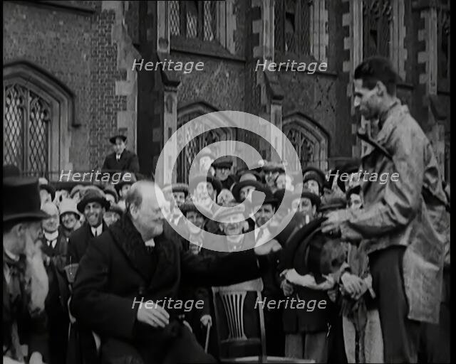 Winston Churchill, Chancellor of the Exchequer, Being Presented With an Irish Cap in Front..., 1926. Creator: British Pathe Ltd.