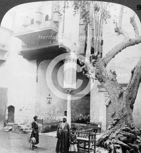 'The harem windows in the court of a wealthy Cairene's house, Cairo, Egypt', 1905.Artist: Underwood & Underwood