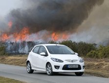 2010 Mazda 2 Sport, controlled burning in New Forest Artist: Unknown.