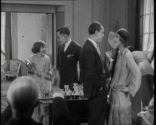 Scene from a 1920s Film. A Group of Actors Playing Bright Young Things Having a Cocktail Party,1920s Creator: British Pathe Ltd.