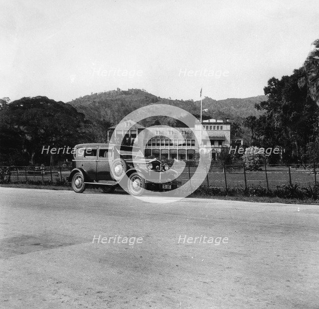 A Singer car in front of the Governor's house, Trinidad, Trinidad and Tobago, 1931 Artist: Unknown