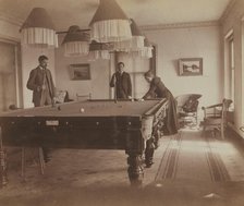 Frederick S Pray, David M Clarkson, and Sarah E Smith, posed by the billiard table..., Russia, 1899. Creator: Eleanor Lord Pray.
