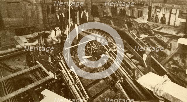 'Constructing Escalators at the Bank Station, London', c1930. Creator: Unknown.