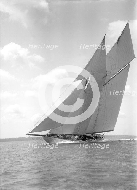 The 250 ton schooner 'Germania' sails close-hauled, 1911. Creator: Kirk & Sons of Cowes.
