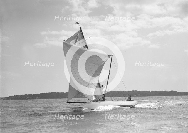 Setting spinnaker on the 8 Metre sailing yacht 'Spero', 1911. Creator: Kirk & Sons of Cowes.