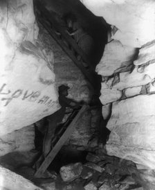 "The Corkscrew" (narrow upward passage), Mammoth Cave, Edmondson County, Kentucky, c1891. Creator: Frances Benjamin Johnston.