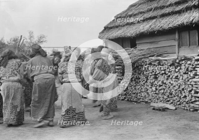 Crane dance of the Ainu women, 1908. Creator: Arnold Genthe.