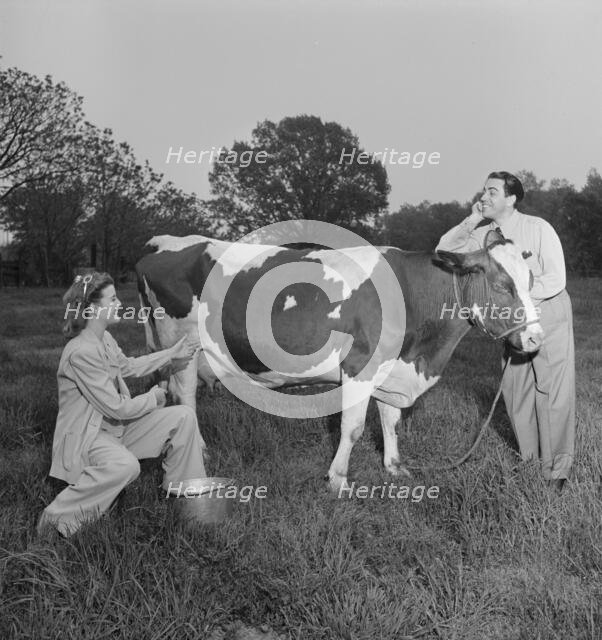 Portrait of Enric Madriguera and Patricia Gilmore on their farm, Connecticut, ca. June 1947. Creator: William Paul Gottlieb.