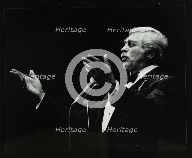 Howard Keel in full song at the Forum Theatre, Hatfield, Hertfordshire, 14 May 1983. Artist: Denis Williams