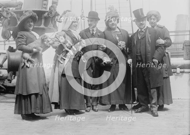 De Rigny and Tety Langy holding dogs, D'Alveres and brother, Oscar and Stella Hammerstein, 1910. Creator: Bain News Service.