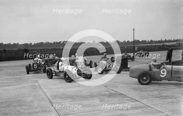 Cars racing at the BARC Meeting on the Campbell Circuit, Brooklands, 15 October 1938. Artist: Bill Brunell.