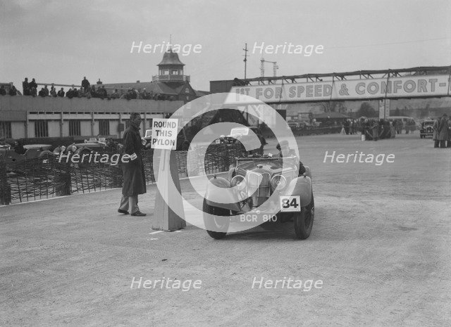 Riley Sprite of Kay Hague competing in the JCC Rally, Brooklands, Surrey, 1939. Artist: Bill Brunell.