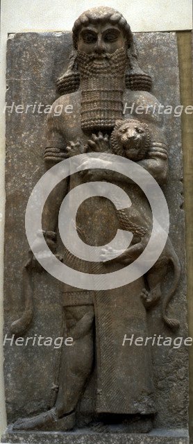Hero Gilgamesh mastering a lion, 722-705 BC. Artist: Assyrian Art  