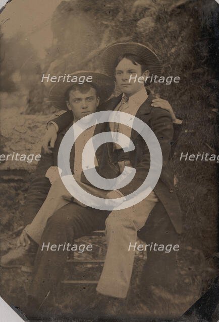 Two Young Men in Straw Hats, One Seated in the Other's Lap, 1870s-80s. Creator: Unknown.