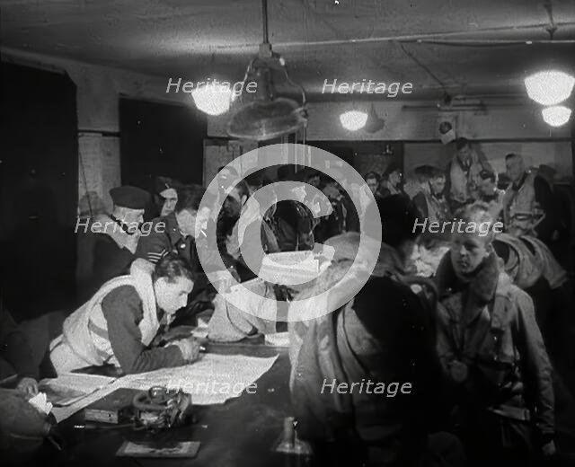 RAF Pilots Planning and Chatting to Each Other, 1942. Creator: British Pathe Ltd.