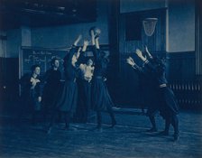 Female students playing basketball in a gymnasium, Western High School, Washington, D.C., (1899?). Creator: Frances Benjamin Johnston.