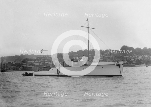 The 12 ton motor yacht 'Cordon Rouge' at anchor, 1923. Creator: Kirk & Sons of Cowes.