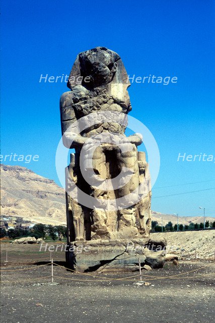One of the Colossi of Memnon, near the Valley of the Kings, Egypt, 14th century BC. Artist: Unknown
