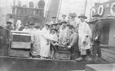 Market porters at Billingsgate, London, (c1930s?). Artist: Unknown