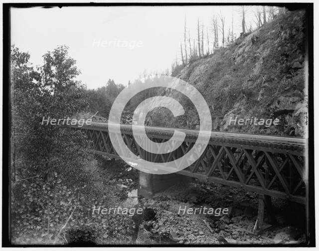 Montreal River, bridge at rock cut, Wisconsin, between 1880 and 1899. Creator: Unknown.