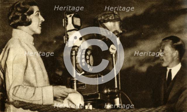 Amy Johnson broadcasting from Croydon Airport, 1930, (1933).  Creator: Unknown.