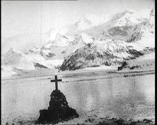 Sir Ernest Shackleton's Grave, Marked with a Cross, on South Georgia Island, 1922. Creator: British Pathe Ltd.