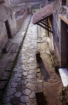 View down Cardo IV (street) from the balcony of the Casa a Graticcio, Herculaneum, Italy. Artist: Unknown