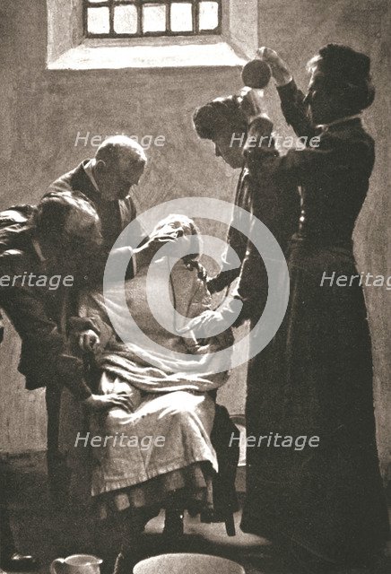 Suffragette being force fed with the nasal tube in Holloway Prison, London, 1909. Artist: Unknown