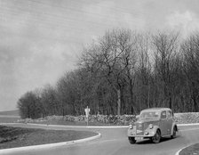 Ford of J McEvoy competing in the RAC Rally, 1939. Artist: Bill Brunell.