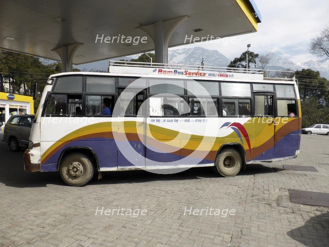 Bus in petrol station at Dharamshala Himachal Pradesh. Creator: Unknown.
