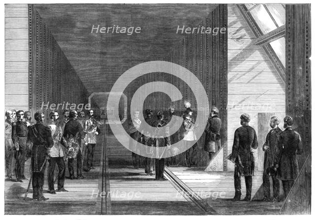 The Prince of Wales closing the last rivet of the Victoria Tubular Bridge over the St. Lawrence...,  Creator: Unknown.