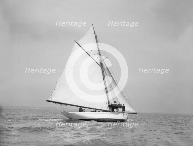 The cutter 'Grisette' sailing close-hauled, 1913. Creator: Kirk & Sons of Cowes.