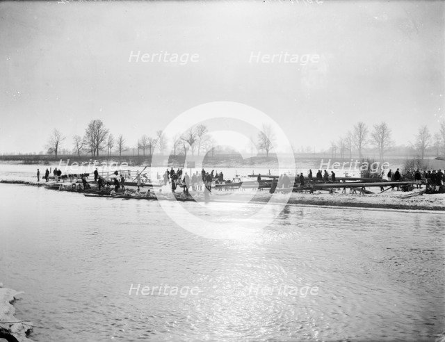 Rowing teams launching boats in the snow, Sandford on Thames, Oxfordshire, c1860-c1922. Artist: Henry Taunt
