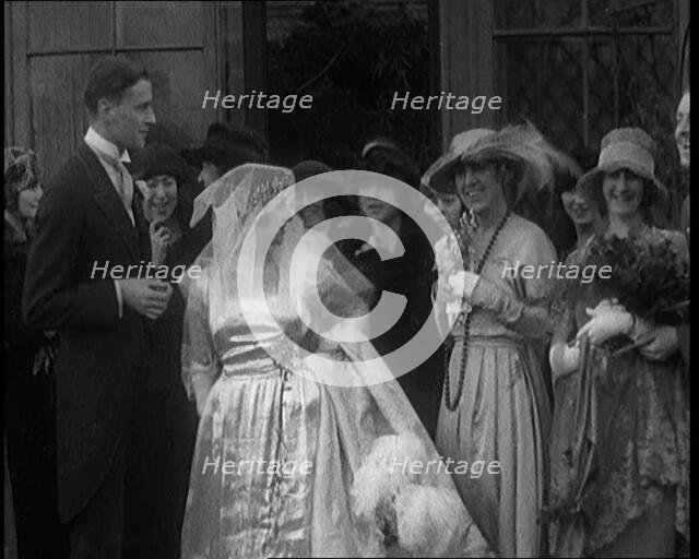 Family Gathering for Photographs at the Wedding of Beatrice Lillie and Sir Robert Peel..., 1920. Creator: British Pathe Ltd.