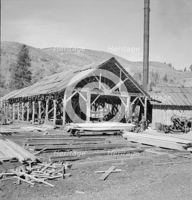 Possibly: The sawmill in operation, Ola self-help sawmill co-op, Gem County, Idaho, 1939. Creator: Dorothea Lange.