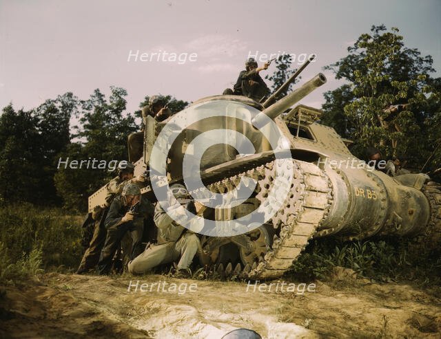 M-3 tank and crew using small arms, Ft. Knox, Ky., 1942. Creator: Alfred T Palmer.
