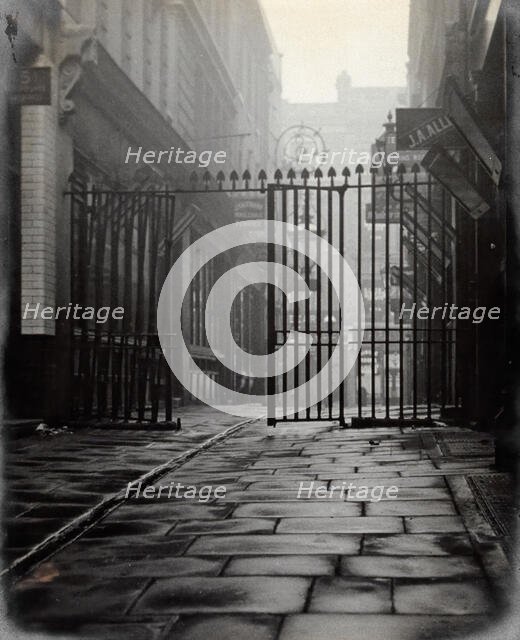 The church of St Bartholomew the Great and surrounding area; iron gates leading to..., 1909 Creator: GW Miller.
