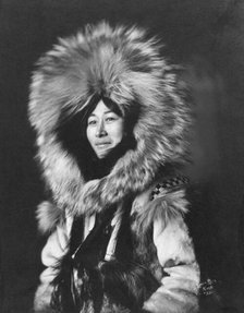 Eskimo woman posing, 1915(?). Creator: Lomen Brothers.