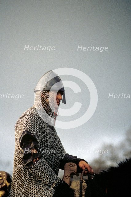 Knight on horseback, from a battle re-enactment.  Artist: Geoffrey Davis